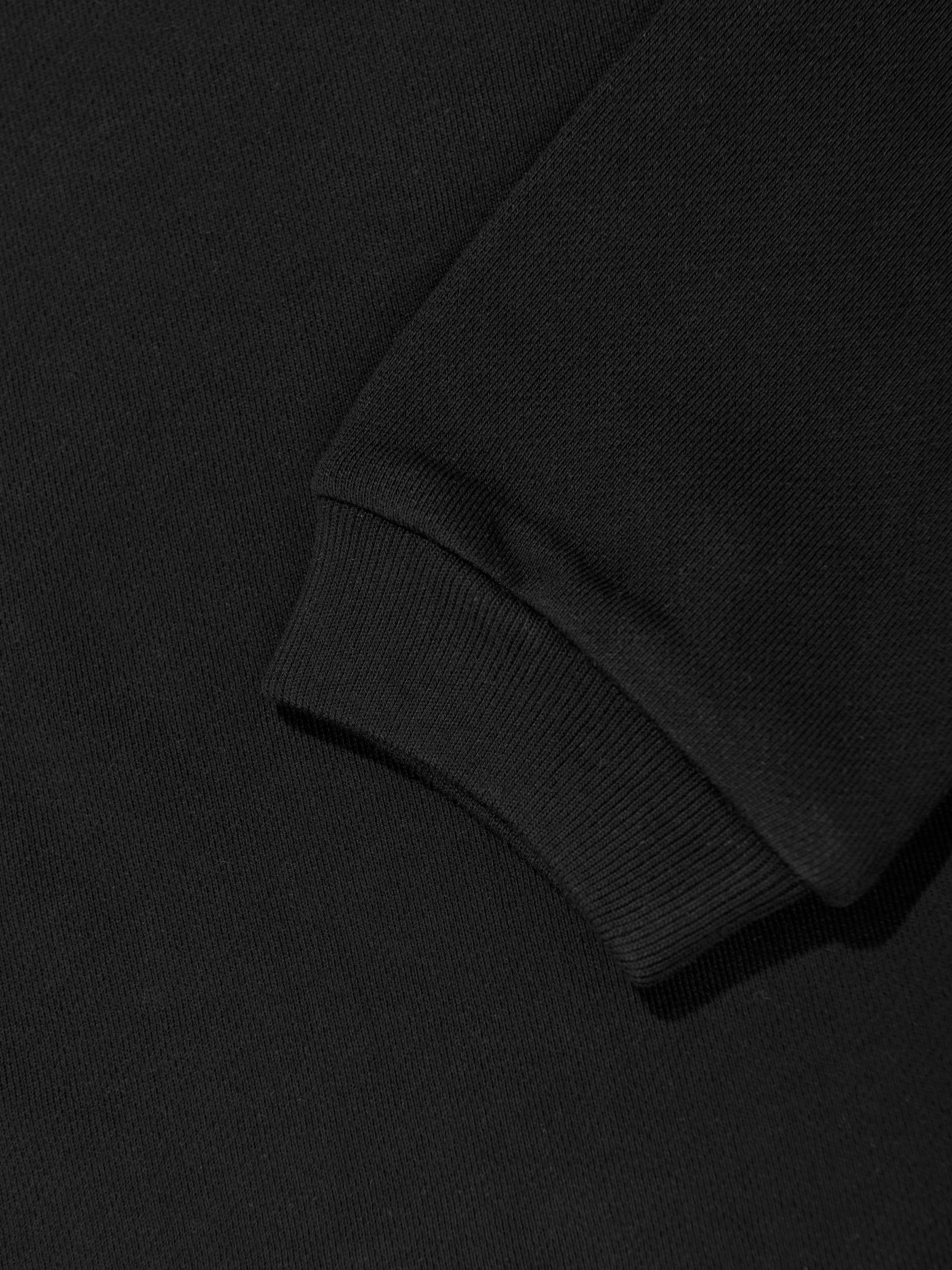 Mädchen Sweatshirt mit Logo aus besetzten Steinen in Schwarz